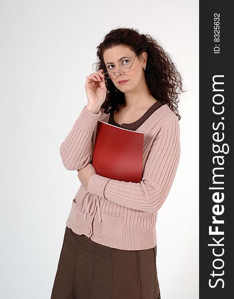 Female with glasses and a red book