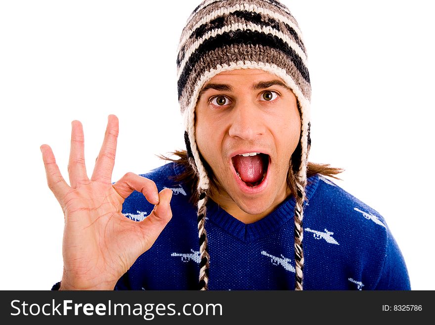 Top view of young man looking through lens against white background