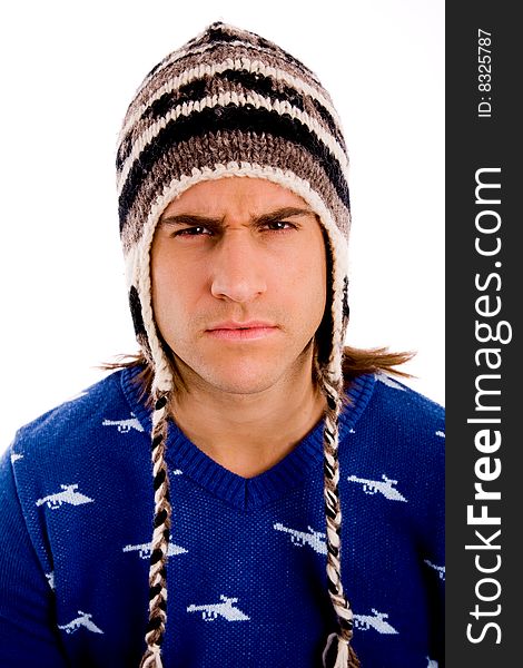 Top view of young man looking through lens against white background