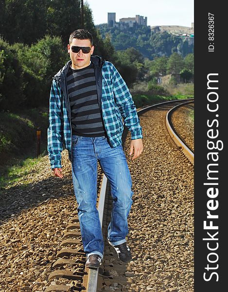 Man walking on a railway. Man walking on a railway