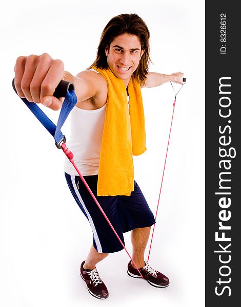 Front view of male carrying racket on an isolated white background