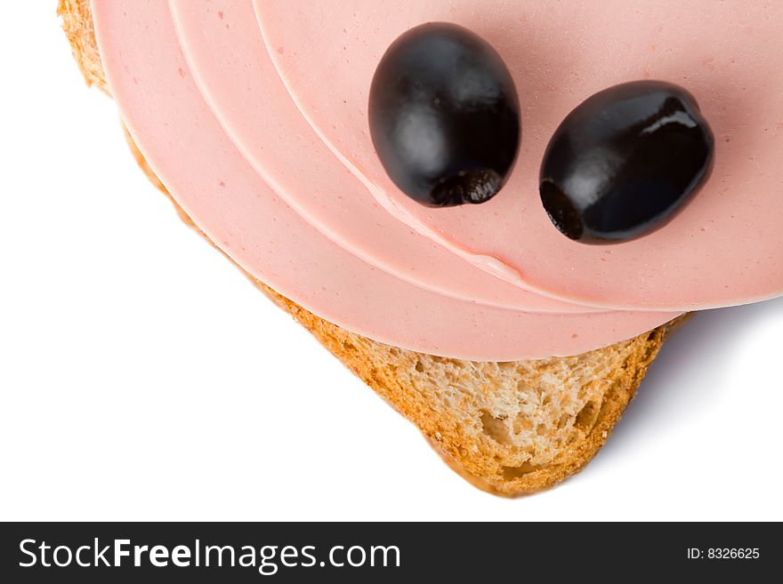 Bread with sausage and olives isolated