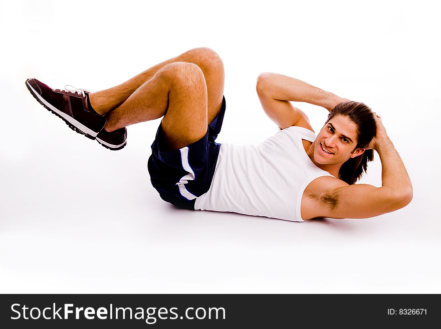 Portrait of powerful man showing muscles on an isolated white background