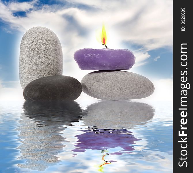 Candle and River Stones