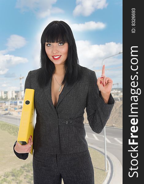 Business woman on construction background