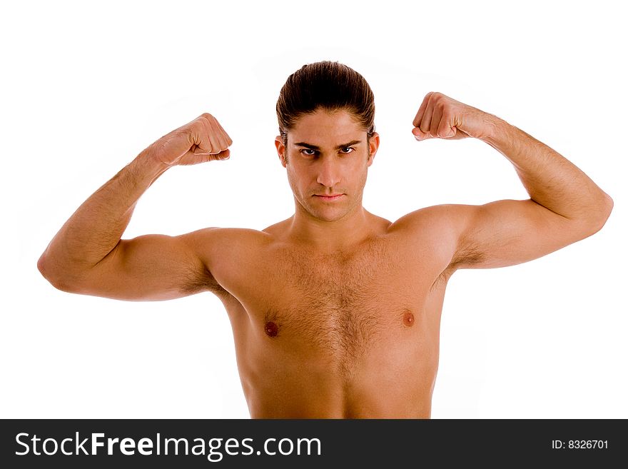 Portrait of powerful man showing muscles on an isolated white background