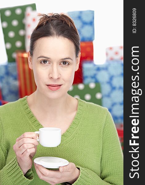 A woman having an espresso, taking a break - shallow depth of field. A woman having an espresso, taking a break - shallow depth of field