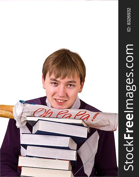 Handsome student with books and baguette in hands on white background. Handsome student with books and baguette in hands on white background