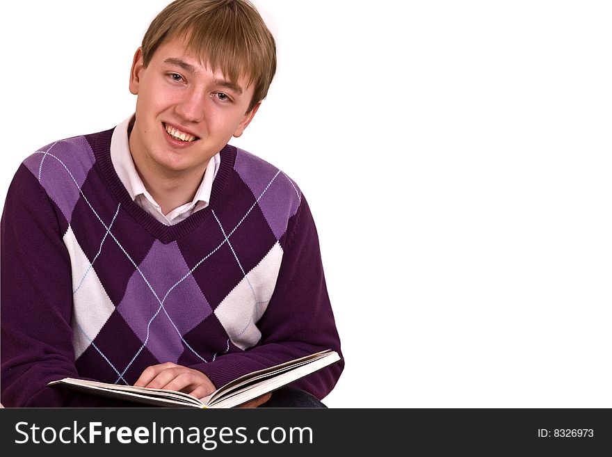 Handsome man sitting and reading in library
on white background. Handsome man sitting and reading in library
on white background