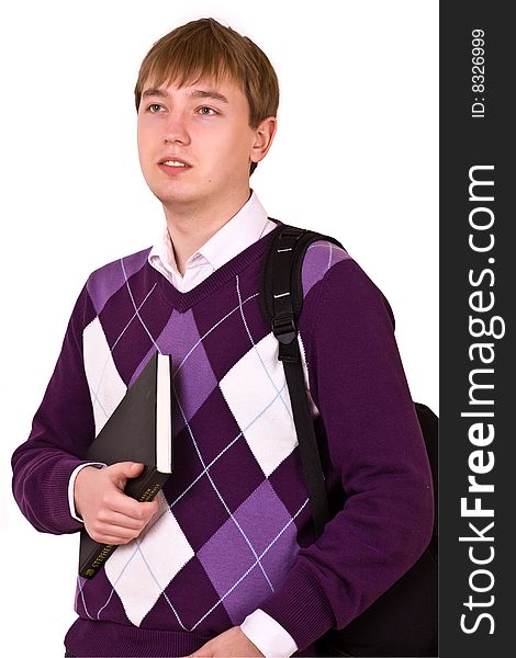 Young happy student carrying bag and books on white background