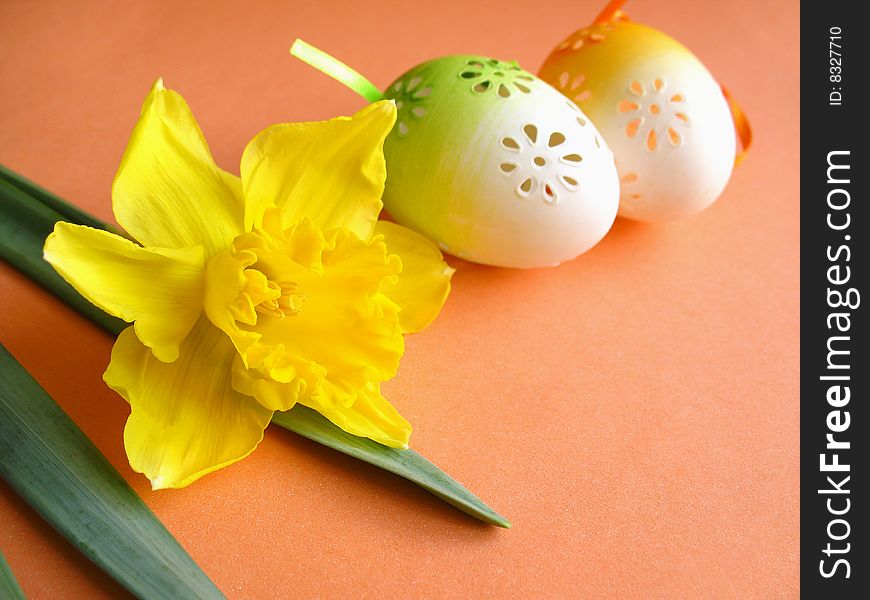 Easter still life, eggs on orange background