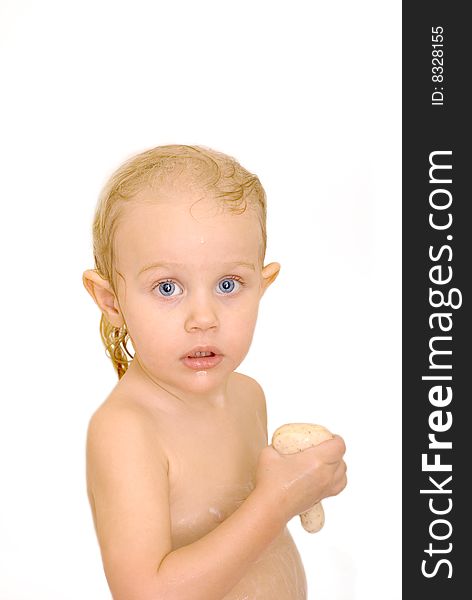 Lovely washing baby-girl with soap isolated over white