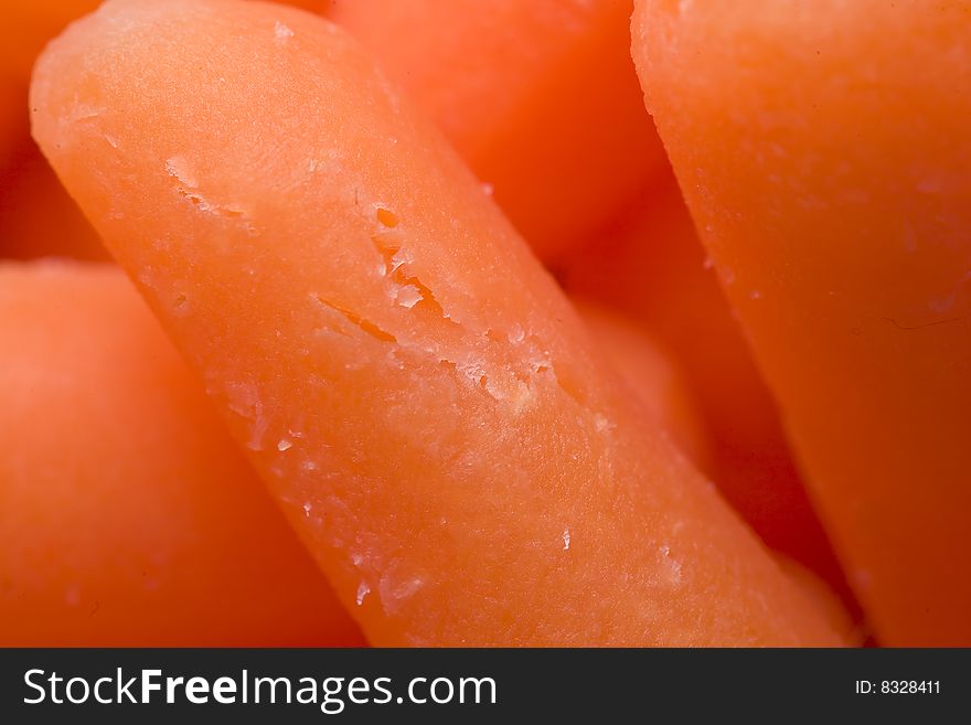 Macro of fresh baby carrots showing texture and form. Macro of fresh baby carrots showing texture and form