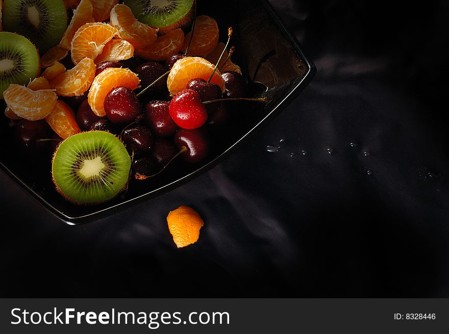 Fresh Juicy fruits on a plate
