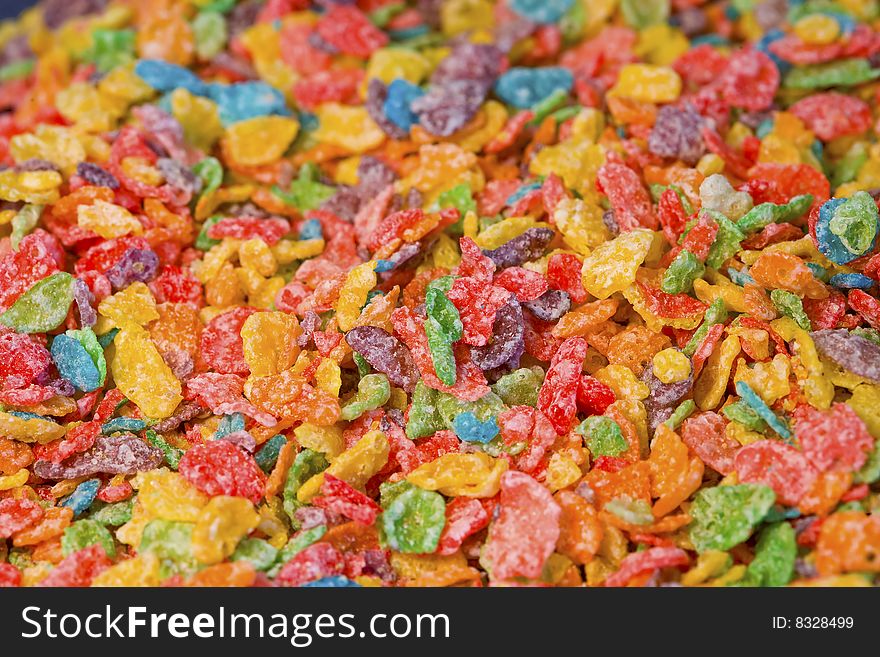 Bright colors and great textures are featured on this photograph of cereal on a black background. Bright colors and great textures are featured on this photograph of cereal on a black background