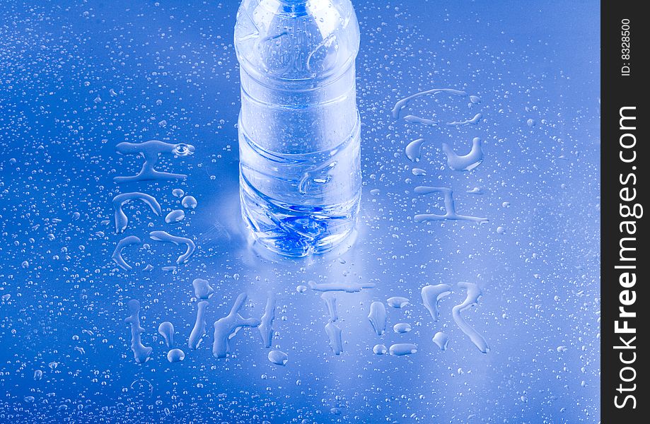 Mineral water in blue bottle