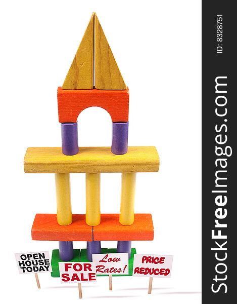 Toy blocks stacked like a tower with pillars. Toy blocks stacked like a tower with pillars