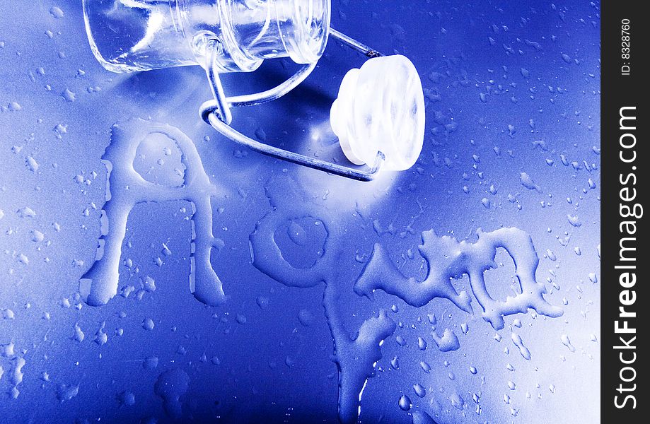 Mineral water drops on blue light background