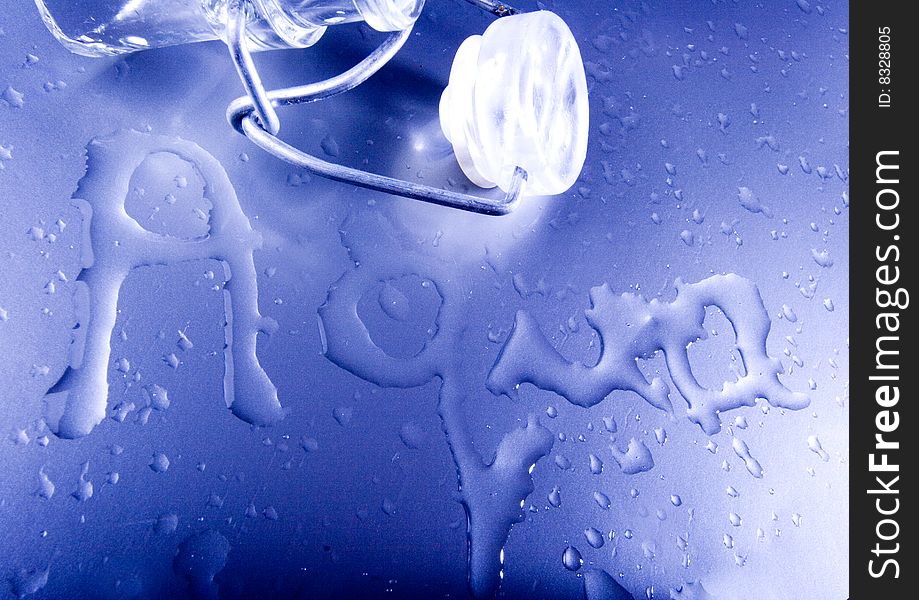 Mineral water drops on blue light background