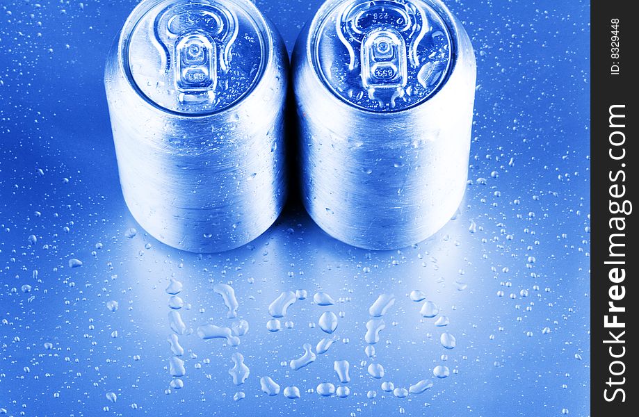 Silver tins and water drops