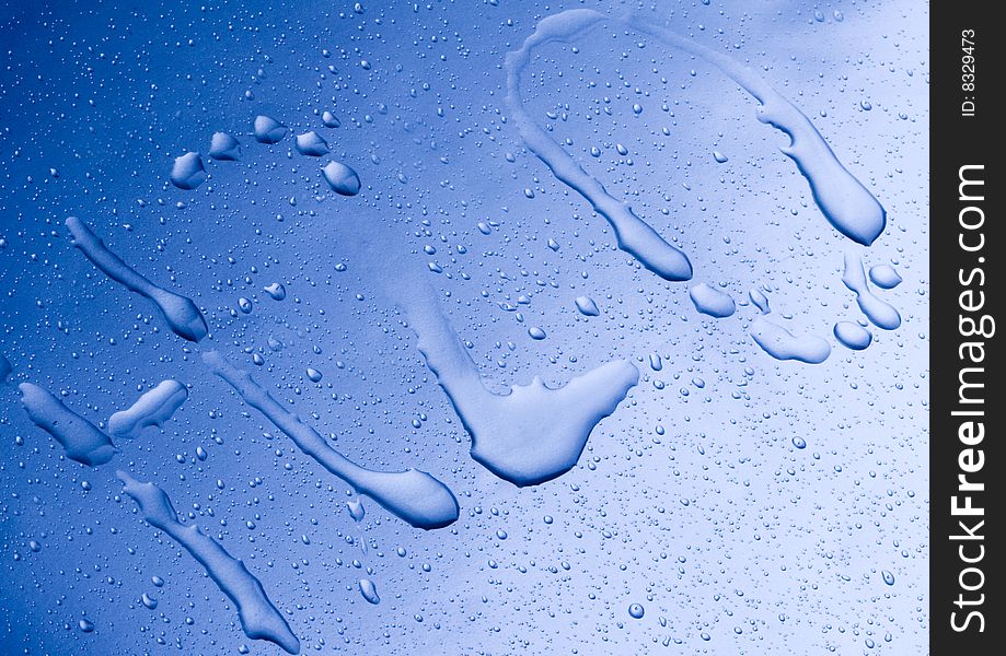 Mineral water drops on blue light background