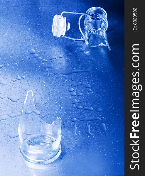 Mineral water drops on blue light background