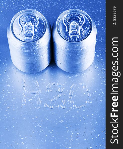 Silver tins and water drops