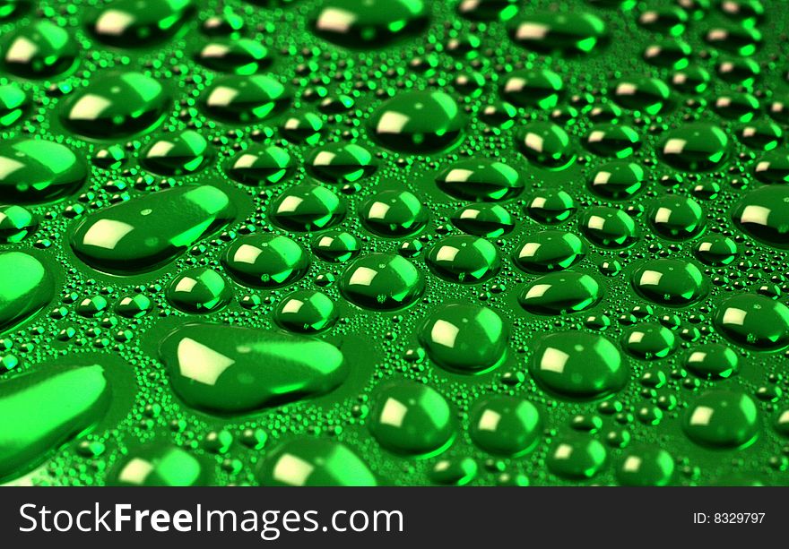 Beautiful green drops of water