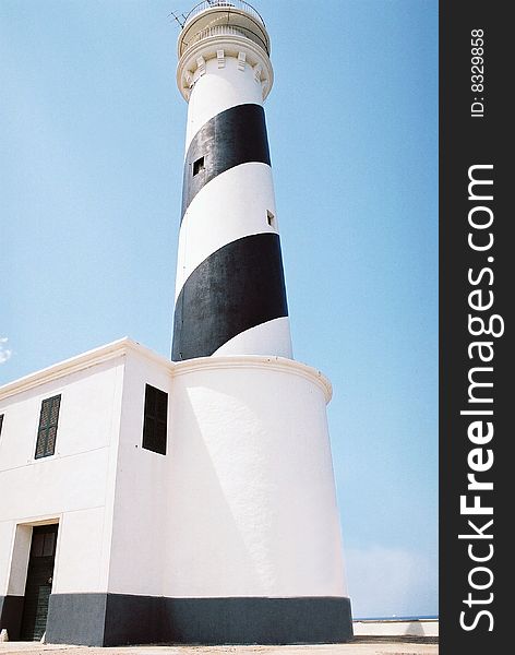 Close up view of a mediterranean beacon in menorca one of the spanish balearic islands. Close up view of a mediterranean beacon in menorca one of the spanish balearic islands