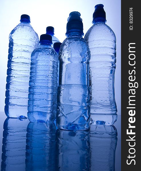 Mineral water in blue bottles