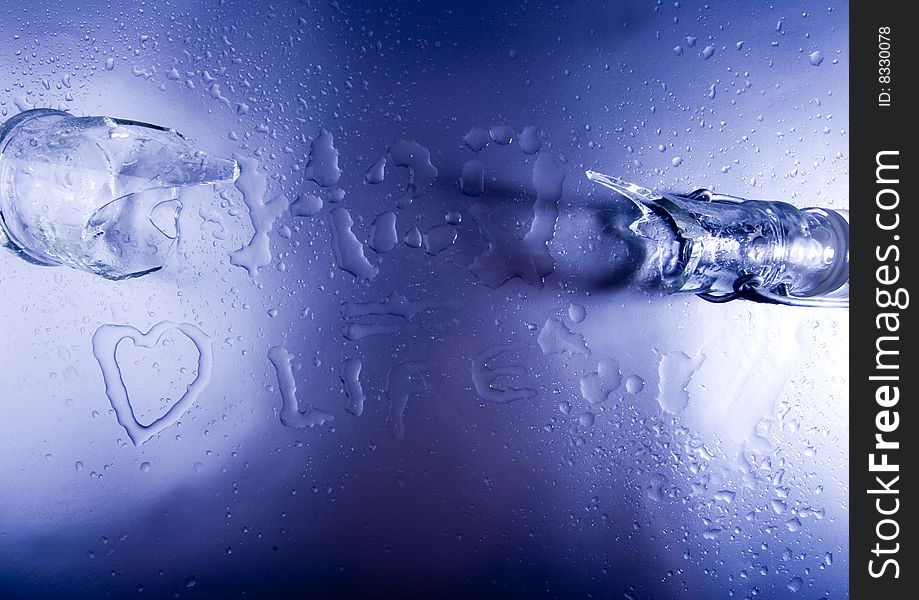 Mineral water drops on blue light background