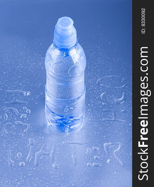 Mineral water in blue bottle
