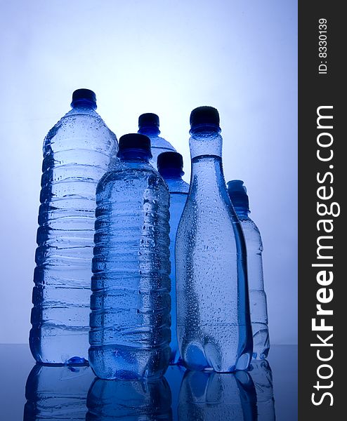 Mineral water in blue bottles