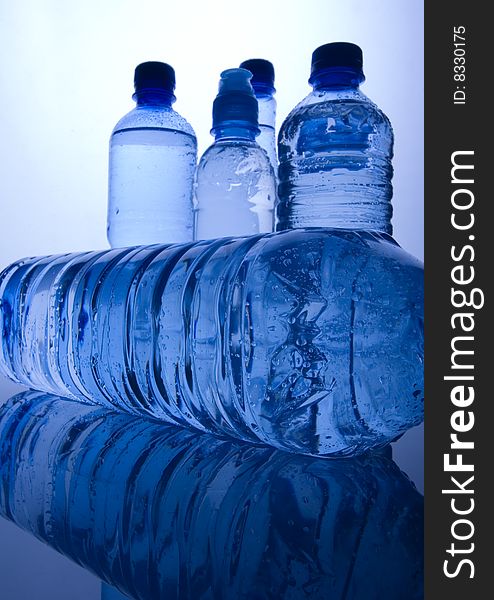 Mineral water in blue bottles