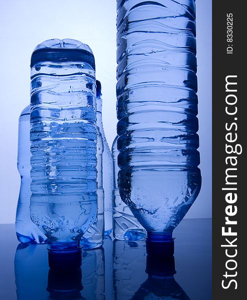 Mineral water in blue bottles