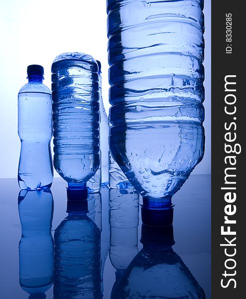 Mineral water in blue bottles