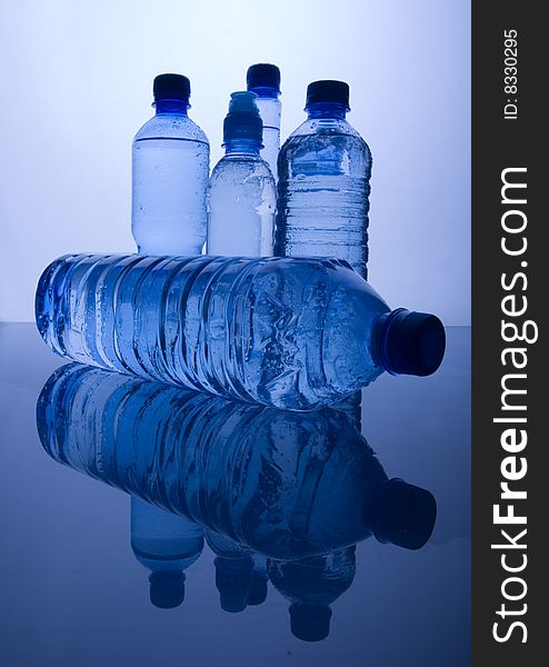 Mineral water in blue bottles