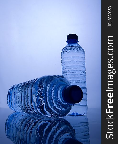 Mineral water in blue bottles