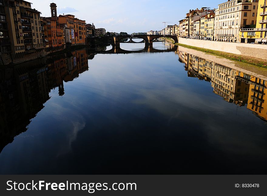 Shot of the river Arno in Florence, Italy taken from the famous Ponte Vecchio bridge. Shot of the river Arno in Florence, Italy taken from the famous Ponte Vecchio bridge