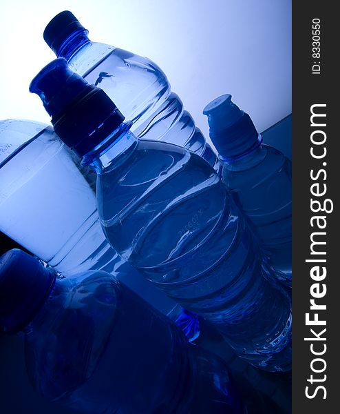 Mineral water in blue bottles