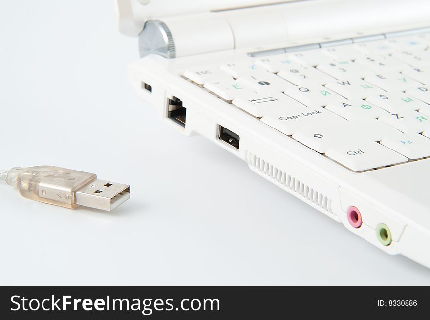 Notebook with usb connector isolated on white