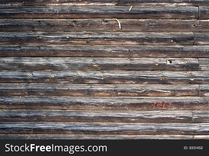 Old rural wall made with logs. Old rural wall made with logs