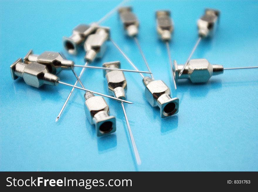 Medical needles on a white background