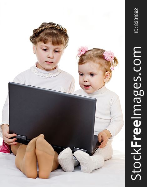 Stock photo: an image of happy girls with laptop