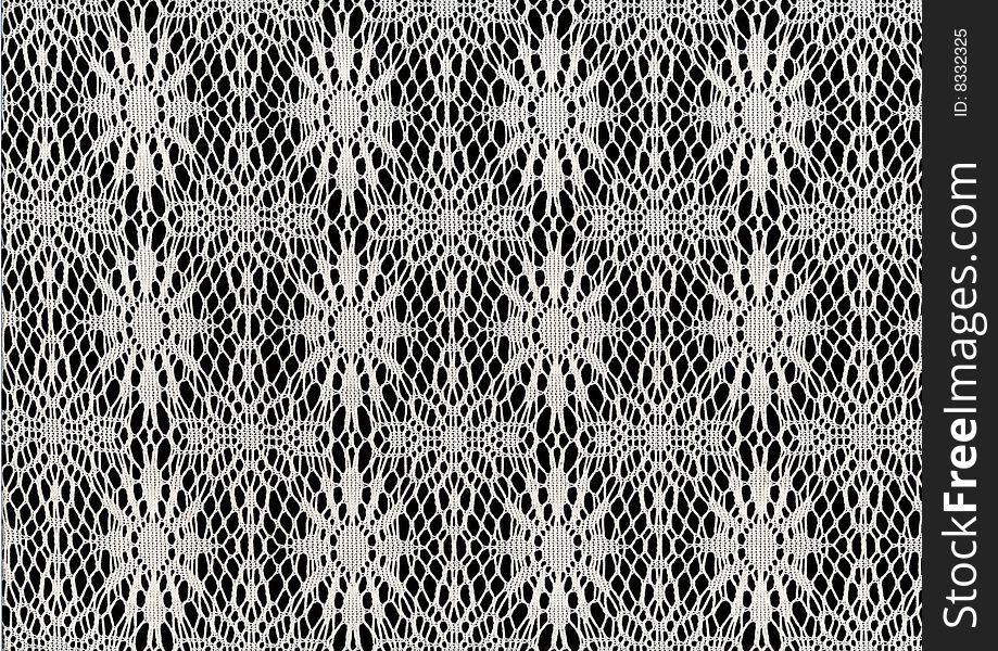 Patterns in white lace on a black background. Patterns in white lace on a black background