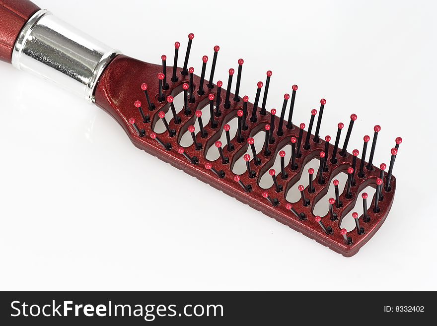 Plastic Hairbrush isolated over bright background