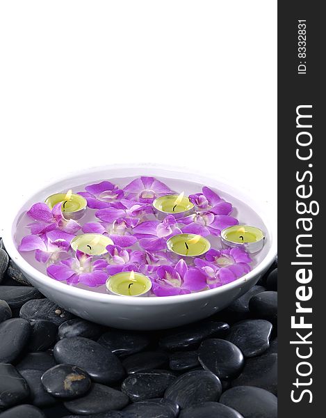 Floral scented water and black pebbles. Floral scented water and black pebbles