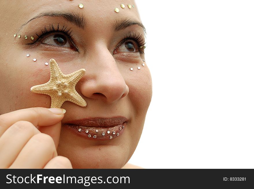 Women with makeup and little seastar. Women with makeup and little seastar