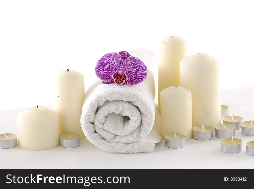 Beautiful orchid , towel on mat. Beautiful orchid , towel on mat