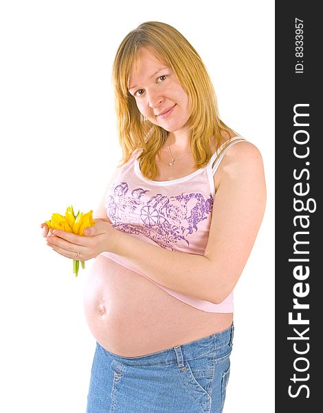 Pregnant woman with yellow flowers on white background